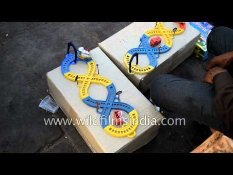 Plastic toy train at street market near Jama Masjid, Delhi