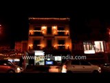 Buildings illuminate on the eve of Diwali