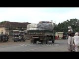 Trucks with recyclable materials at Alang Sosiya ship recycling yard