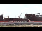 A ship being recycled at the Alang shipyard in India