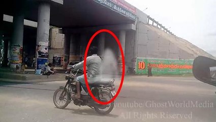 Person Riding a Bike With Ghost