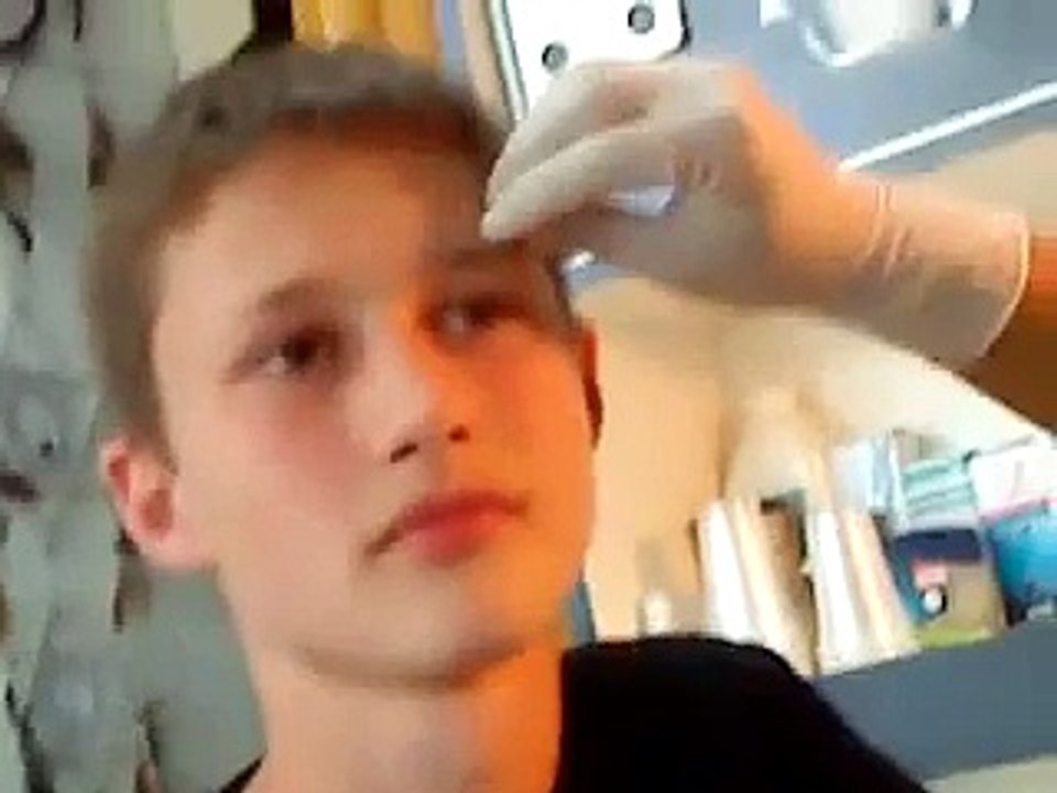 Vertical eyebrow piercing