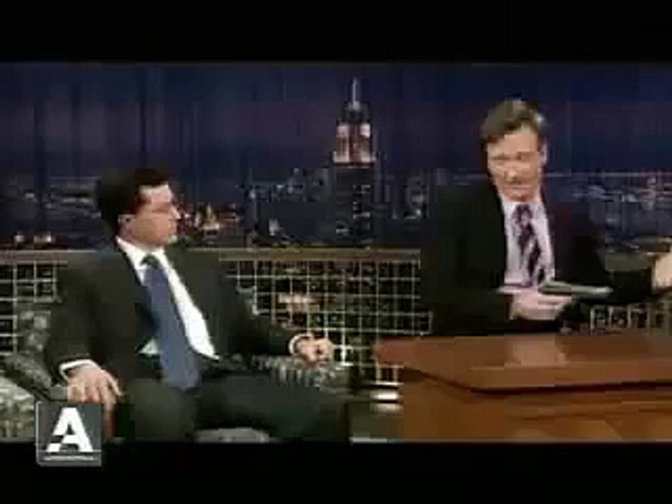 Conan Shoots Stephen Colbert
