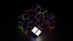 A trippy 3D animation of a Tron-style rubik's cube