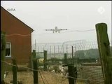 Plane flies low over house