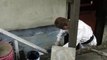 Apply a coat of cement plaster to cinder blocks, concrete, or bricks