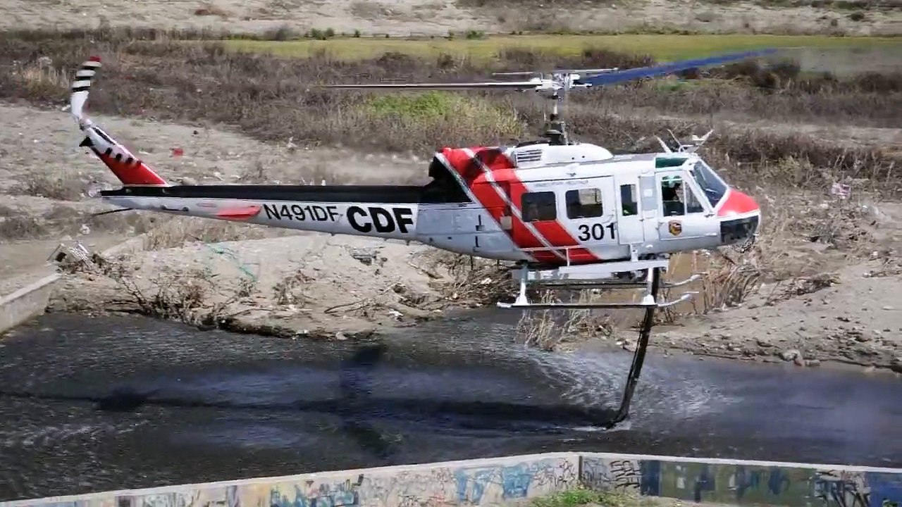 Orange County Fire Helicopter in formation flight with CDF Cal Fire