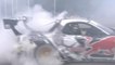 Mad Mike Whiddett - drifting sideways in the paddock. One-handed.