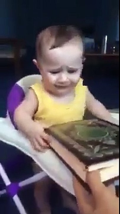 A baby touch the quran pak To Happy