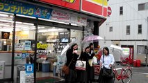 Japanese High School Girls hanging out in front of convenience store