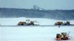 Sapporo Chitose Airport Snow clearing machinery at work.