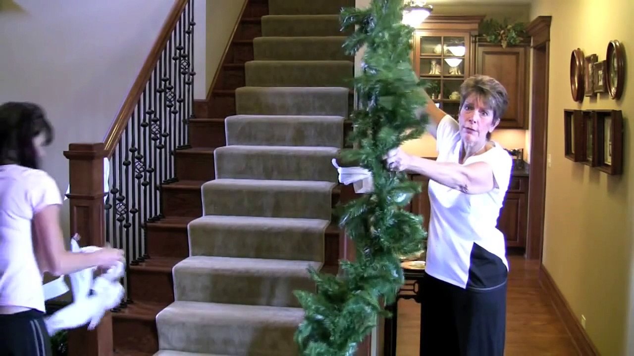 Decorating a banister and staircase with Christmas Garland with Janeen