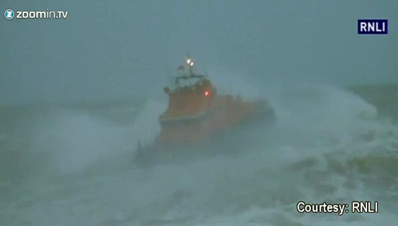 Boy swept off as hurricane-force storm hits Britain