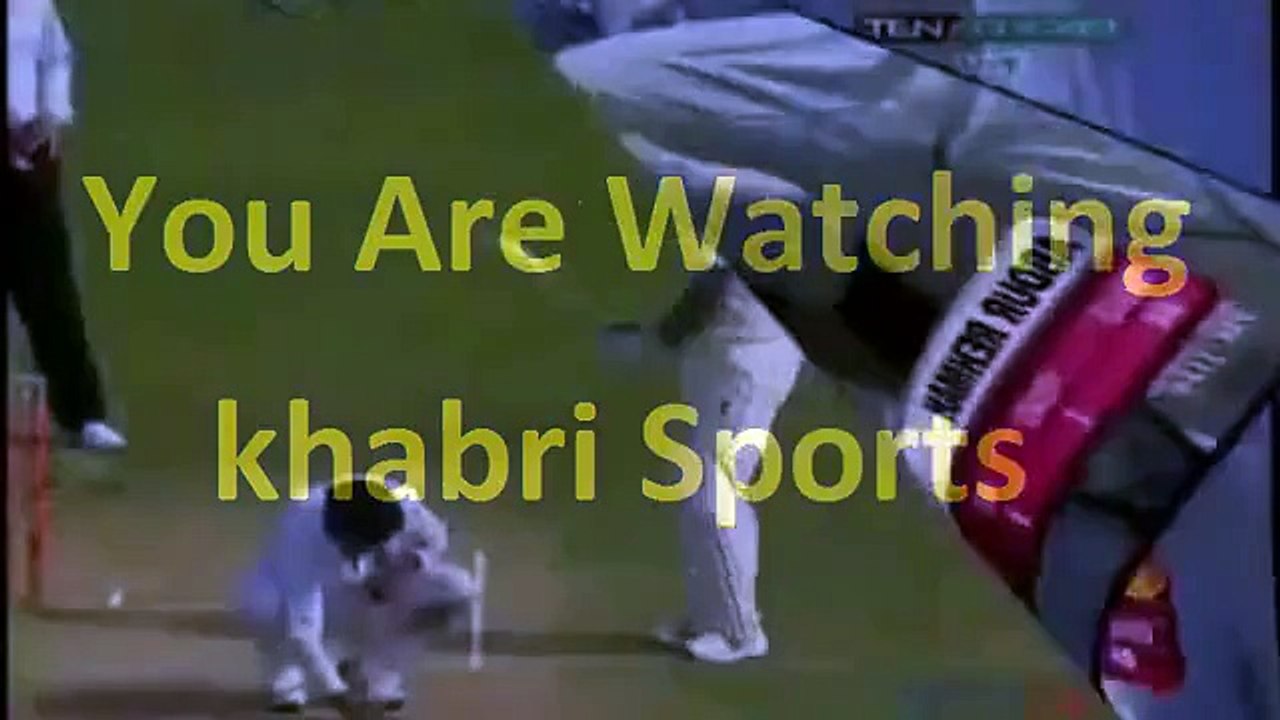 Very funny: Bishoo is hit with Umar Akmal's bat