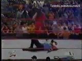 WWF - Kane Choke slams Taker through the ring then steals his bike!