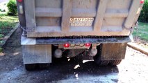 TOO FAST! Tri-Axel Dump-Truck Tailgate Spread OVERSHOOTS on gravel driveway