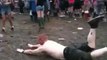 Dumb guy sliding in girl's urine during festival : FAIL