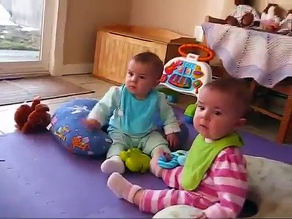 Twin babies waiting for dad