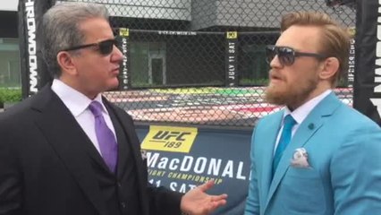 Bruce Buffer and Conor McGregor