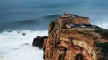Garret McNamara surfa a maior onda da história em Nazaré, Portugal