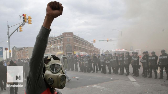 Baltimore's night of chaos ends in flames