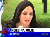 Angelina Jolie Reading Quran during an interview- pk maza