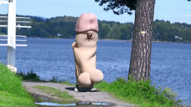 Giant P E N I S sprays confetti to promote safe pleasure