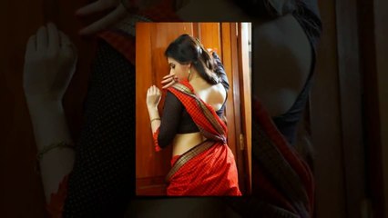 Archana Hot Sensuous Looking Photoshoot in Red Saree