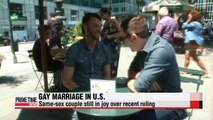 Same-sex couples still in joy of legalization of gay marriage in U.S.