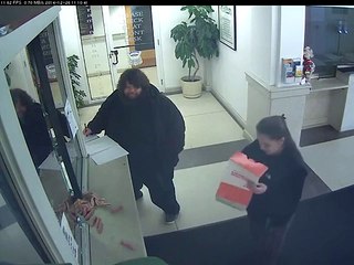 What she is doing in Police Station ?