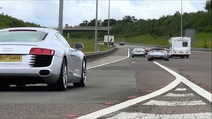 Скачать видео: 50 Supercars acclerating  M6 toll supercar charity Event toll plaza accelerations