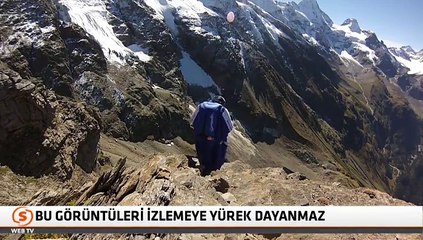 Adrenalin bağımlısı sporcu 2 metrelik mağaradan uçarak geçti