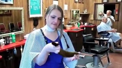 hair getting all chopped off at a barbershop