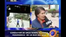 Arriba Bogotá: Conductor de grúa rompió vidrio panorámico de bus SITP
