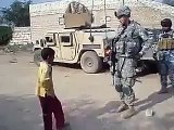 .U.S. soldiers dancing with Iraqi children in Baghdad, U.S. Army