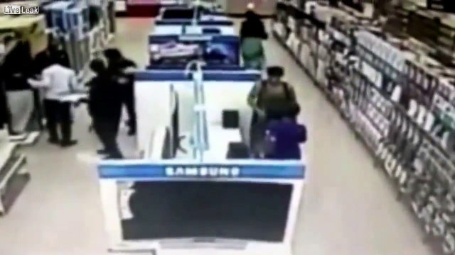 Woman Caught Putting An LCD TV Under Her Skirt from Samsung Display Center