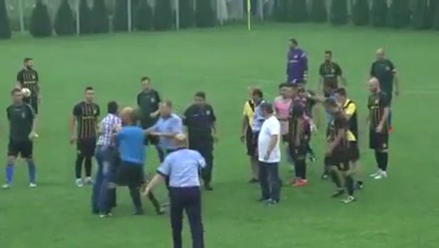 Romanian soccer coach punches referee in the face after a bad call