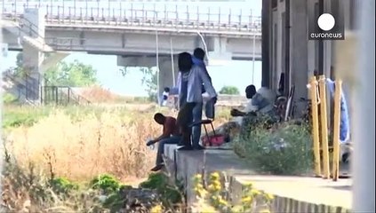 Status approved, but nowhere to go: refugees form makeshift camp in Italy