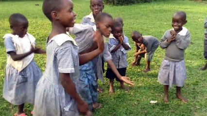 Batwa kids dancing at the Educational Soup Kitchen