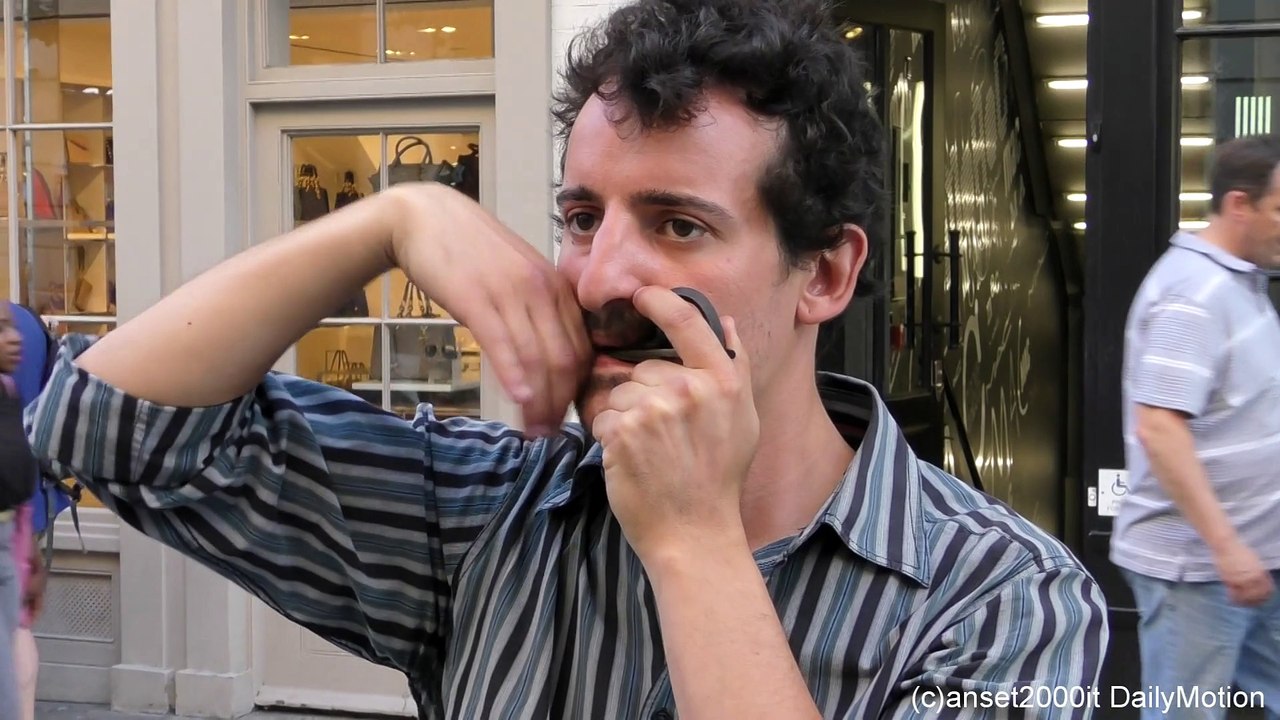 London Street Music. The "Scacciapensieri" Intrument from Sicily, Italy