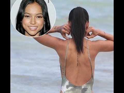 Karrueche Tran Reveals Bare Butt In Camouflage Swimsuit