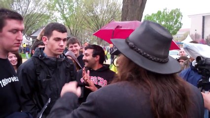 Aron Ra has words with a couple of Ray Comfort followers & is interrupted by...