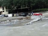 Lifted Jeep Crossing Flooded River