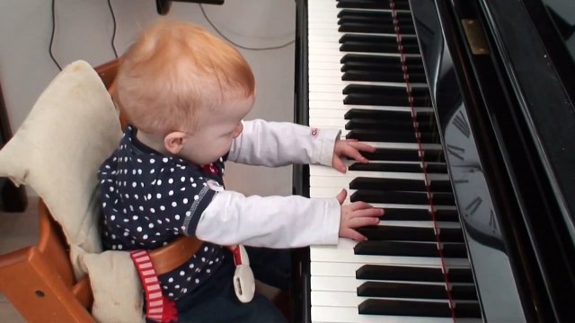Amazing one year old child plays a piano concert