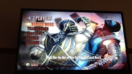 Gaming -Apple and Blondie play Mortal Kombat 9