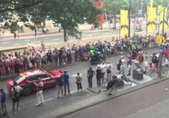 Man Hits the Ground Hard While Scrambling for a Waterbottle at the Tour De France