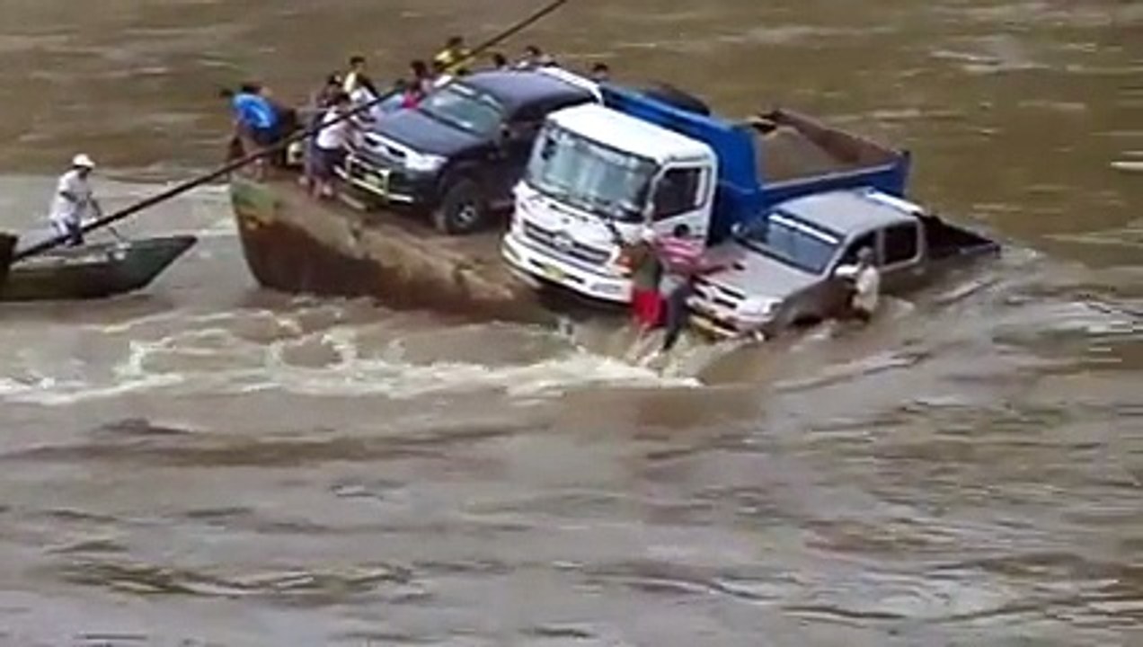 Truck & Cars plunging in to river