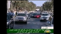 Colonel Gaddafi 'parades through Tripoli in a jeep to delight of supporters