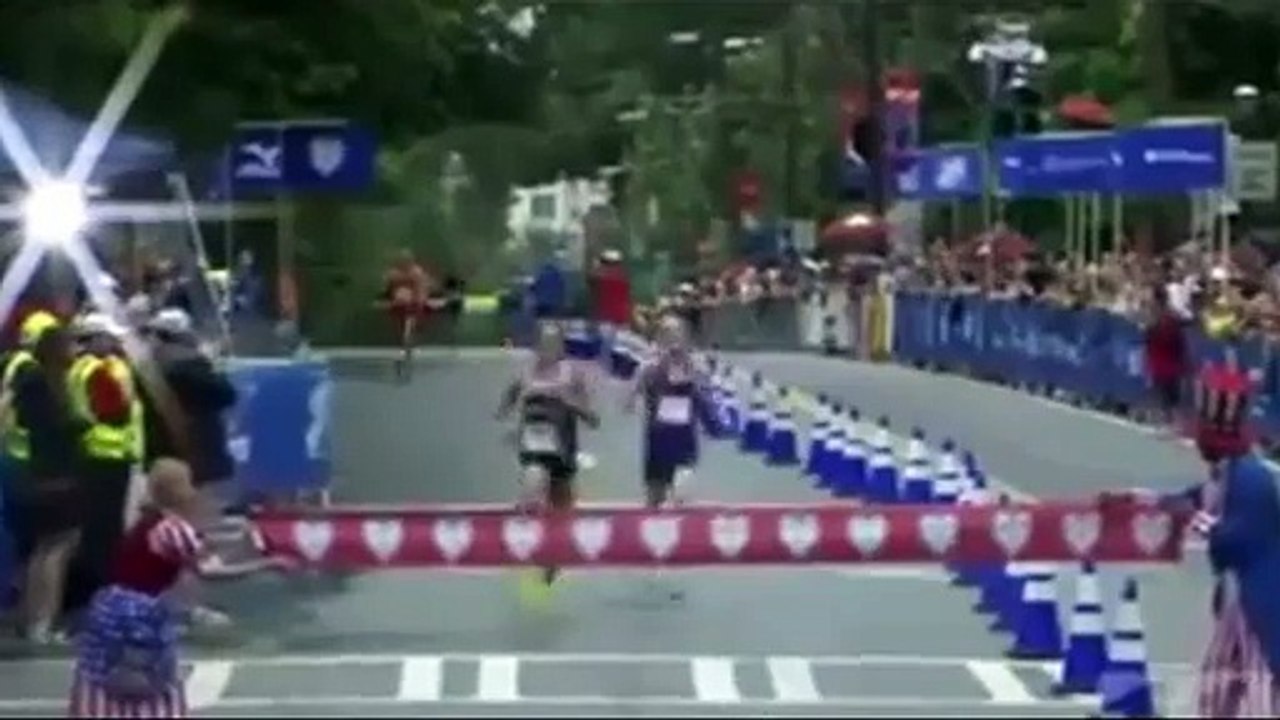 Marathon runner gets beat after celebrating too soon