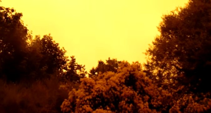 Orange Sky Forms Over British Columbia After Brush Fire